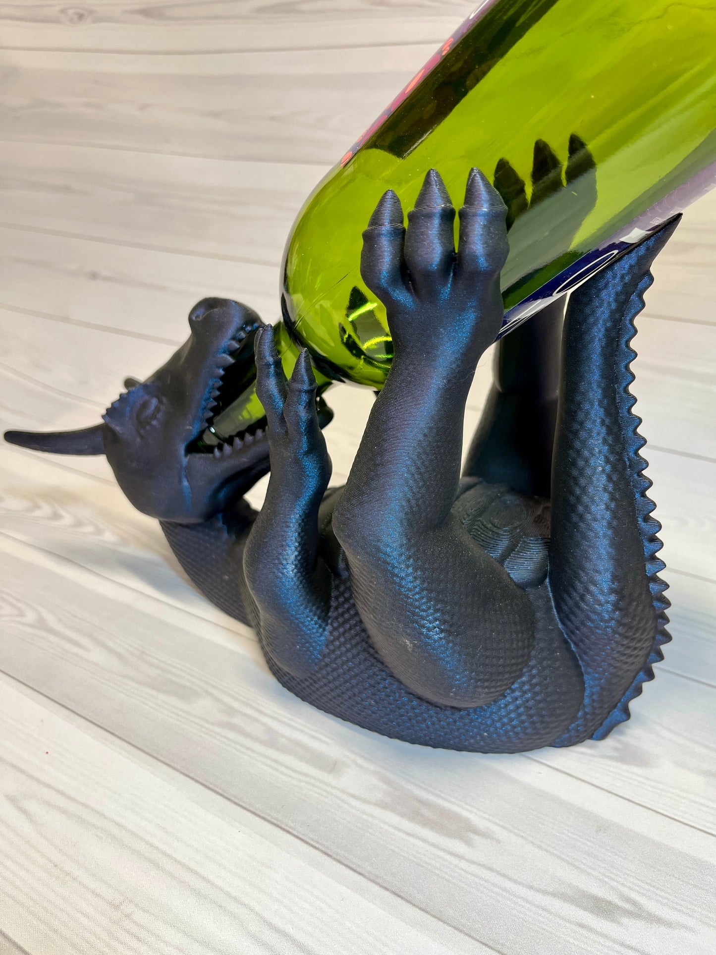 Wine Bottle holding dragon